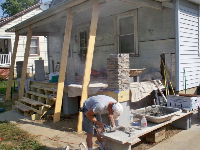 My mason doing a great stone job.