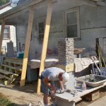 My mason doing a great stone job.